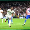 Real Madrid, down to ten men, secures thrilling derby victory, keeping La Liga title hopes alive